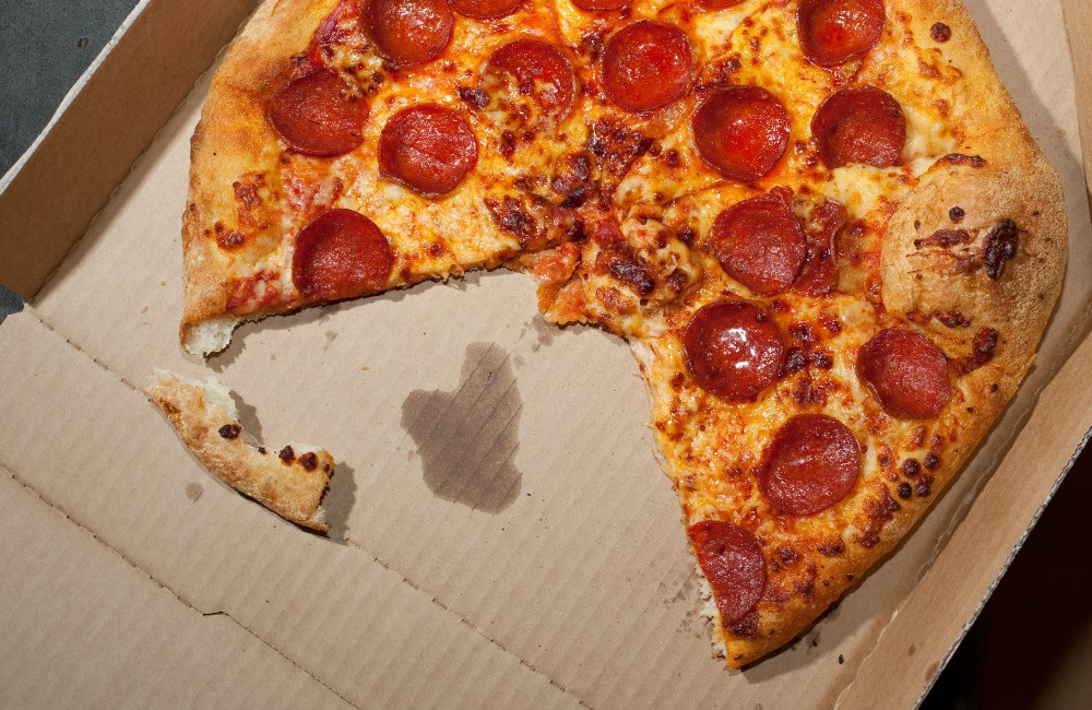 Young Brits having pizza instead of Christmas dinner