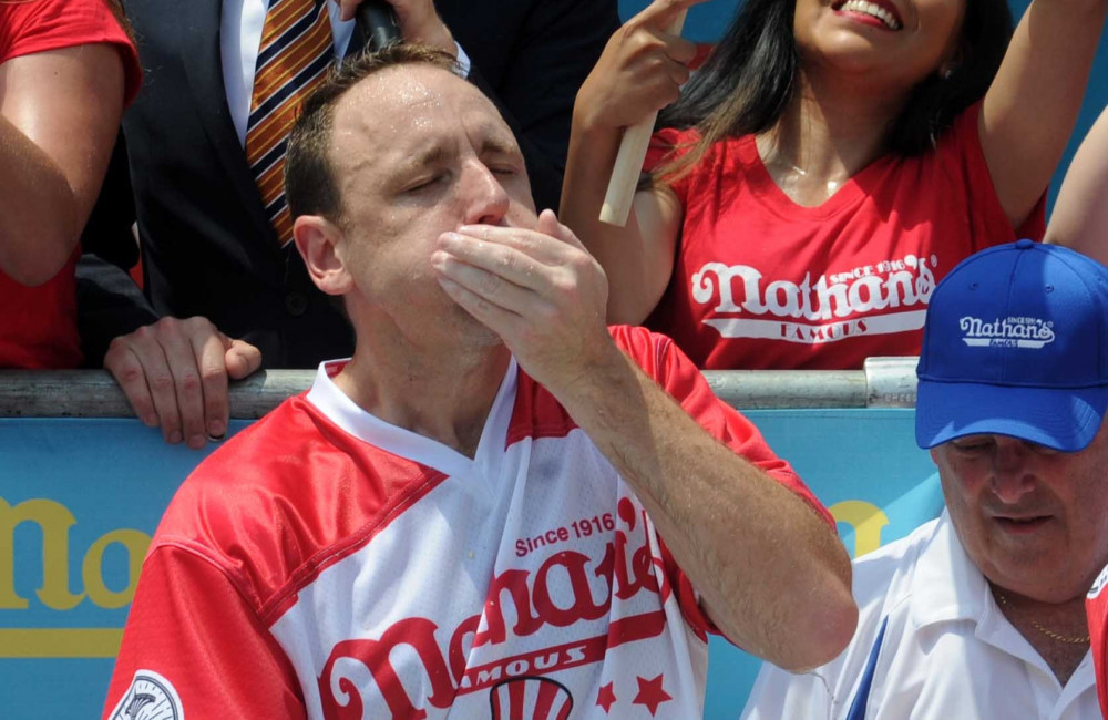 Joey 'Jaws' retains hot dog eating record after scoffing 66 in 10 minutes